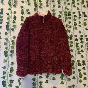 Burgundy fur jacket.